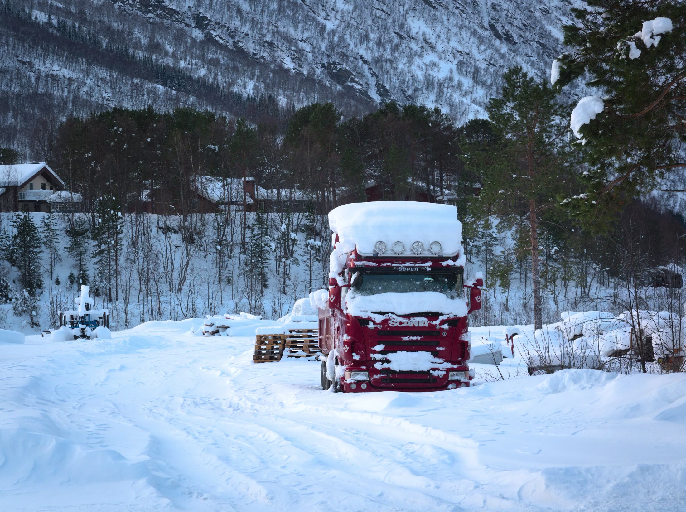 Scania truck in a heavy snow environment